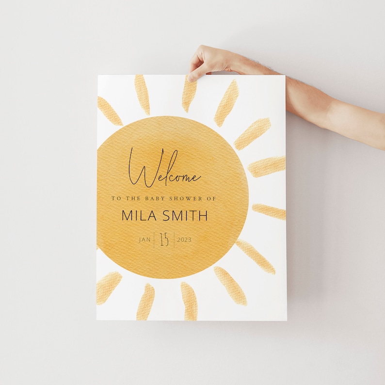 K&ouml;nnte beinhalten: Eine gelbe Aquarellsonne mit Strahlen auf wei&szlig;em Hintergrund. Der Text "Willkommen zur Babyparty von Mila Smith Jan 15 2023" ist auf die Sonne gedruckt.