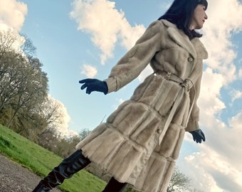 Vintage 1970s luxury fit and flare faux fur and  real leather coat ivory colour