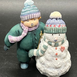 Lang Ornaments Sno Nuk #23 1998 By Sherri B. Baldwin Boy Snowsuit With Snowman