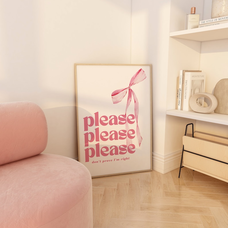 May include: A pink and white art print with a pink watercolor bow and the text "please please please don't prove I'm right".
