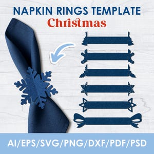May include: A navy blue napkin with a snowflake napkin ring. The image also shows several navy blue Christmas-themed napkin rings with various designs, including a Christmas tree, holly, and a bow. The text "NAPKIN RINGS TEMPLATE Christmas" is at the top.