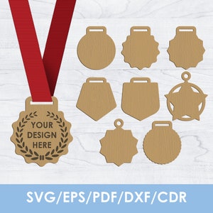 May include: A collection of eight light brown wooden medal templates in various shapes, including circular, star, and scalloped designs. One medal features a red ribbon and the text YOUR DESIGN HERE surrounded by a laurel wreath graphic.