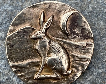 Hare with crescent moon and mountain brooch in bronze