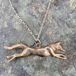 Running fox pendant / necklace in bronze by Paul Szeiler