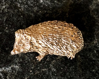 Hedgehog brooch in bronze