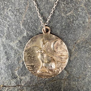 Hare crescent moon and mountain pendant necklace in bronze