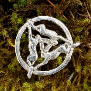 Three hares brooch in sterling silver