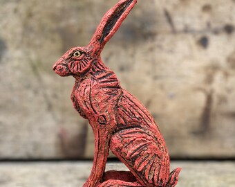 Orange hare in ceramic by Paul Szeiler
