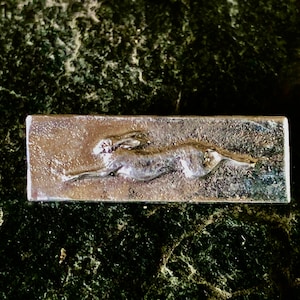 Hare running brooch in pewter by Paul Szeiler