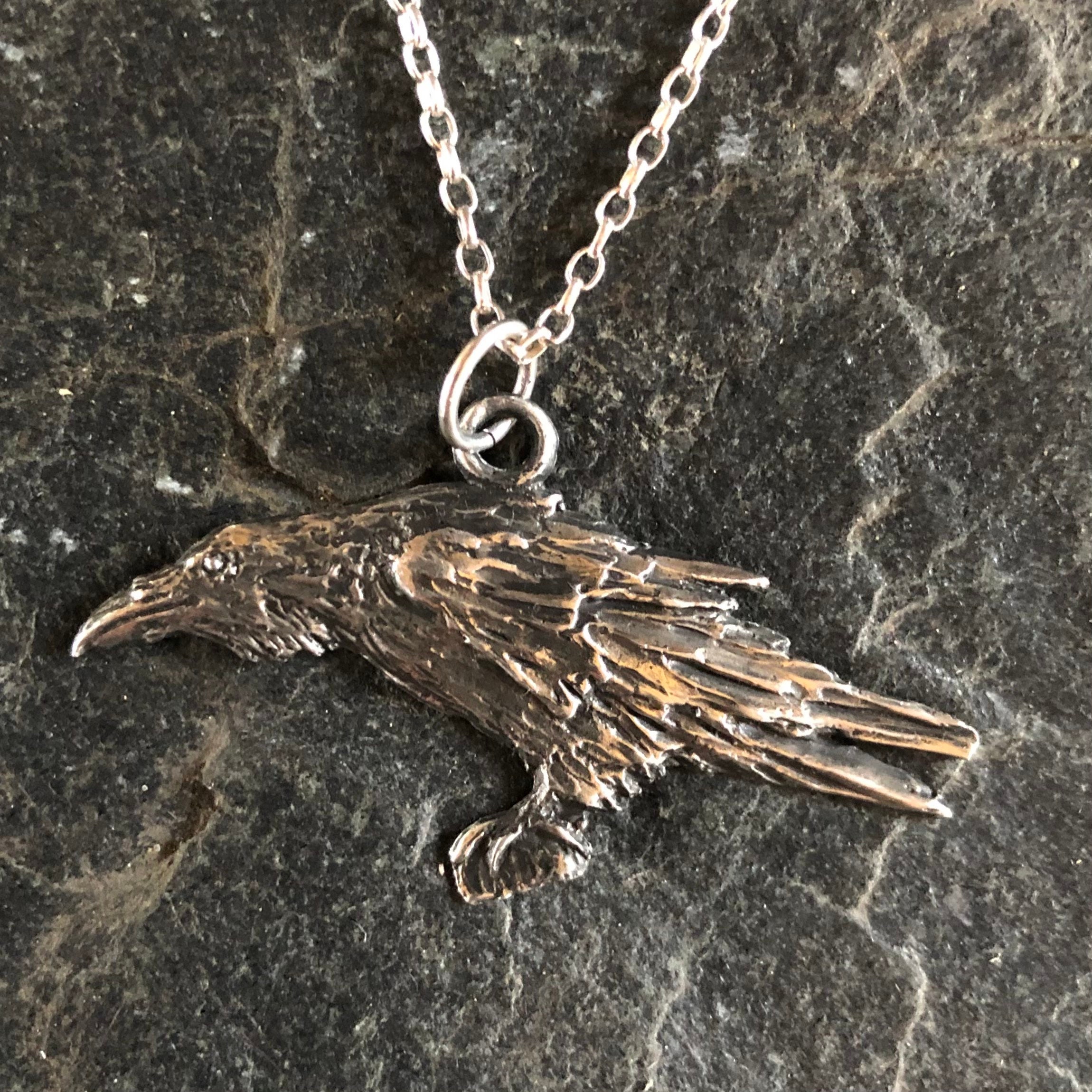 Silver raven hotsell pendant