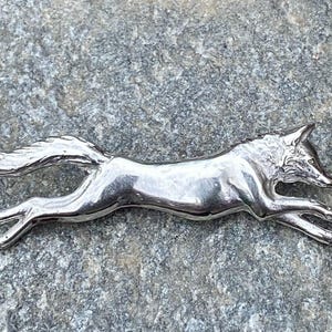 Fox Running Brooch in sterling silver .