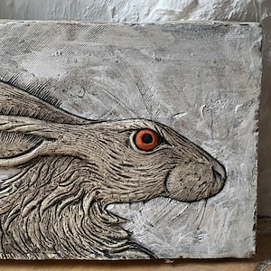 Hare’s head in low relief ceramic plaque / wall hanging.