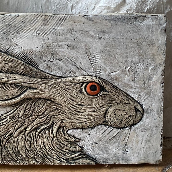 Hare’s head in low relief ceramic plaque / wall hanging.