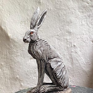 White Hare sculpture in stoneware ceramic by Paul Szeiler.