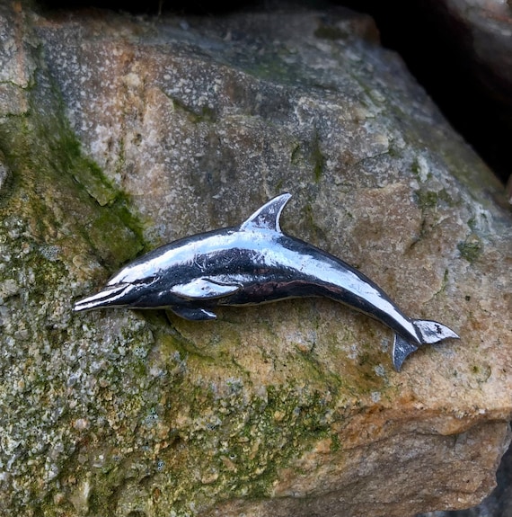 Dolphin brooch on sale