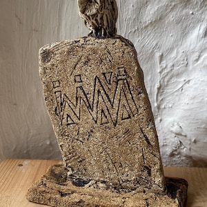Owl on standing stone sculpture by Paul Szeiler