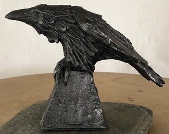 Raven sculpture in terracota