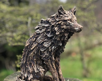 Wolf sculpture in ceramic stoneware hand sculpted by Paul Szeiler