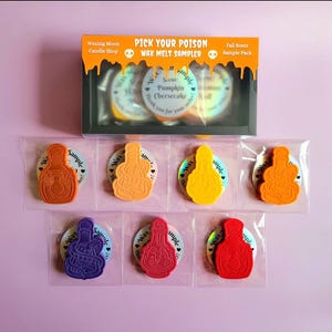 May include: A selection of colourful wax melt samplers, shaped like perfume bottles, in shades of orange, yellow, red, and purple. The packaging features the text "Pick Your Poison Wax Melt Sampler" and "Fall Scent Sample Pack".