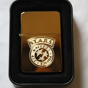 S.T.A.R.S. Raccoon City R.P.D. Messing aansteker in goud en cadeaublik - GRATIS GRAVURE