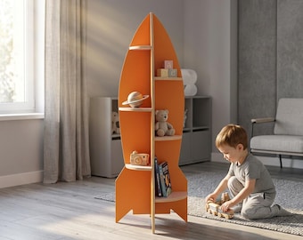 May include: A tall, orange, rocket-shaped wooden shelving unit with multiple tiers. The shelves hold various items including a small globe, a plush teddy bear, a wooden toy camera, and several books. The structure has a pointed top and fins.