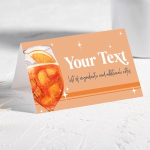 Plantilla de tarjeta de lugar editable Aperol Spritz Plantilla de despedida de soltera naranja Love First Spritz Brunch nupcial Etiqueta de bebida de boda Tarjeta de tienda 2605