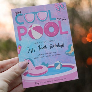 May include: A pink and blue birthday invitation with the text "Stay Cool by the Pool" and "Ivey's Tenth Birthday!"  The invitation features a pool with a unicorn float, a beach towel, sunglasses, and a beach ball. The text "Join us to celebrate" is also included.