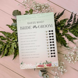 May include: A green and white printable bridal shower game card with the text "Guess Who? Bride or Groom" and a list of questions about the bride and groom. The card is decorated with floral illustrations and black bow ties.