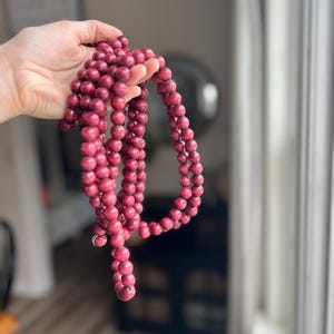 Vintage wooden bead garland, cranberry colored sandalwood bead string, 9 feet long