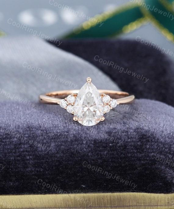 Pear shaped moissanite store rose gold engagement ring