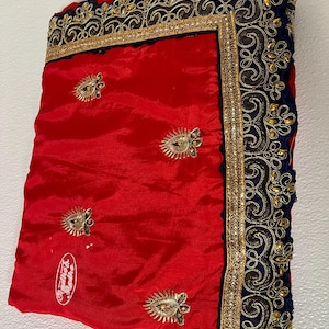 Semi silk red saree with navy blue border