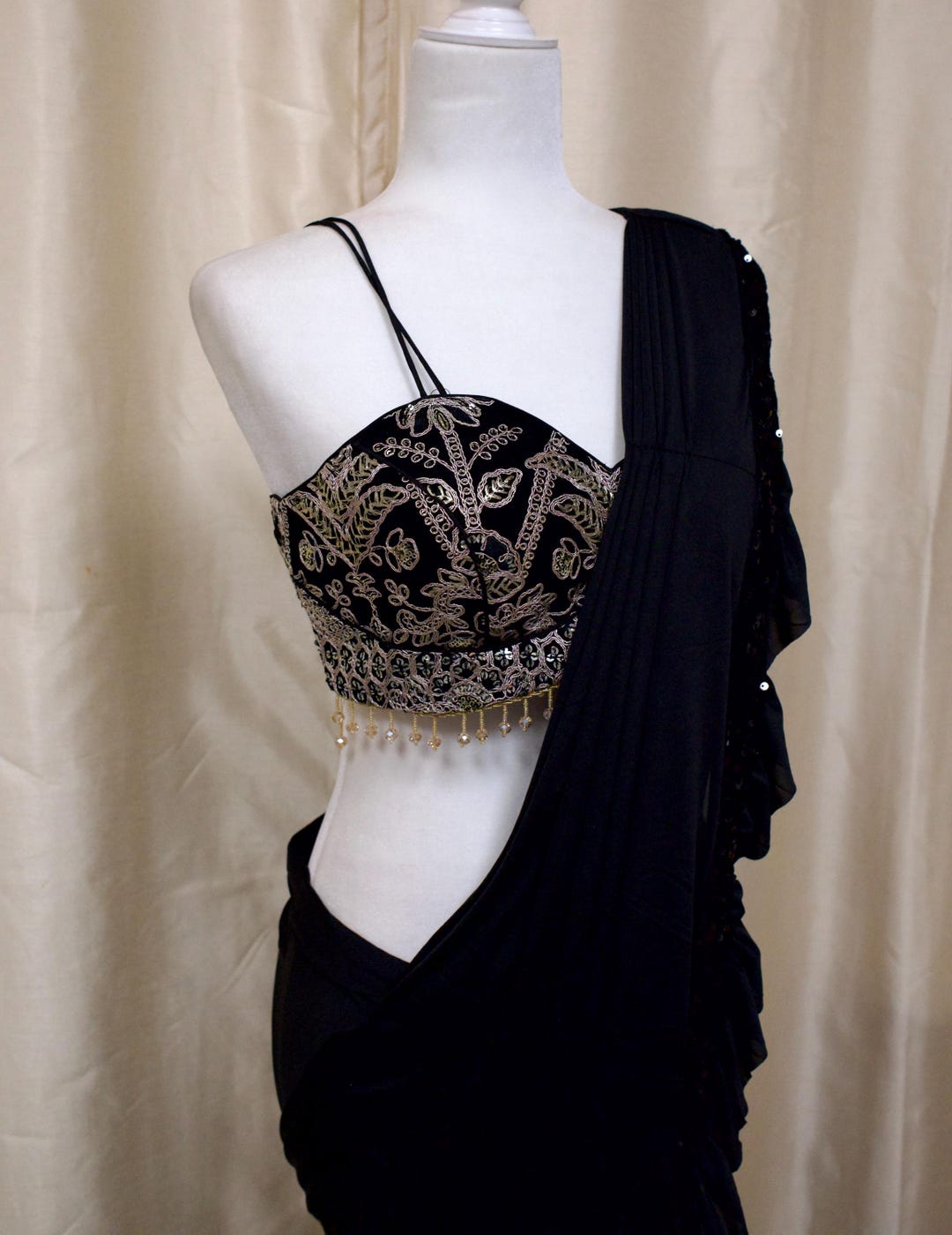 Black Woven Gold Saree with Pendants