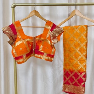Stitched blouse Orange/ maroon and gold Bandni bandhani art silk saree