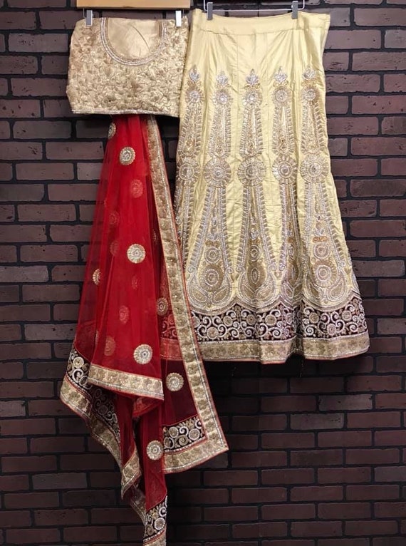 maroon and gold bridal lehenga