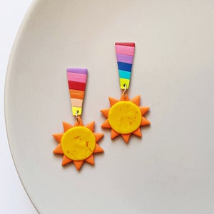Handmade sun clay earrings with rainbow studs, colorful statement jewelry, festival accessories, retro fashion, unique gifts for her