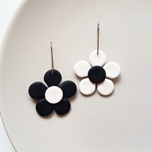 Mismatched black and white daisy clay earrings, retro jewelry, indie aesthetic festival accessories, minimalist fashion, unique gift for her