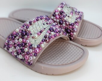 purple gold nike slides