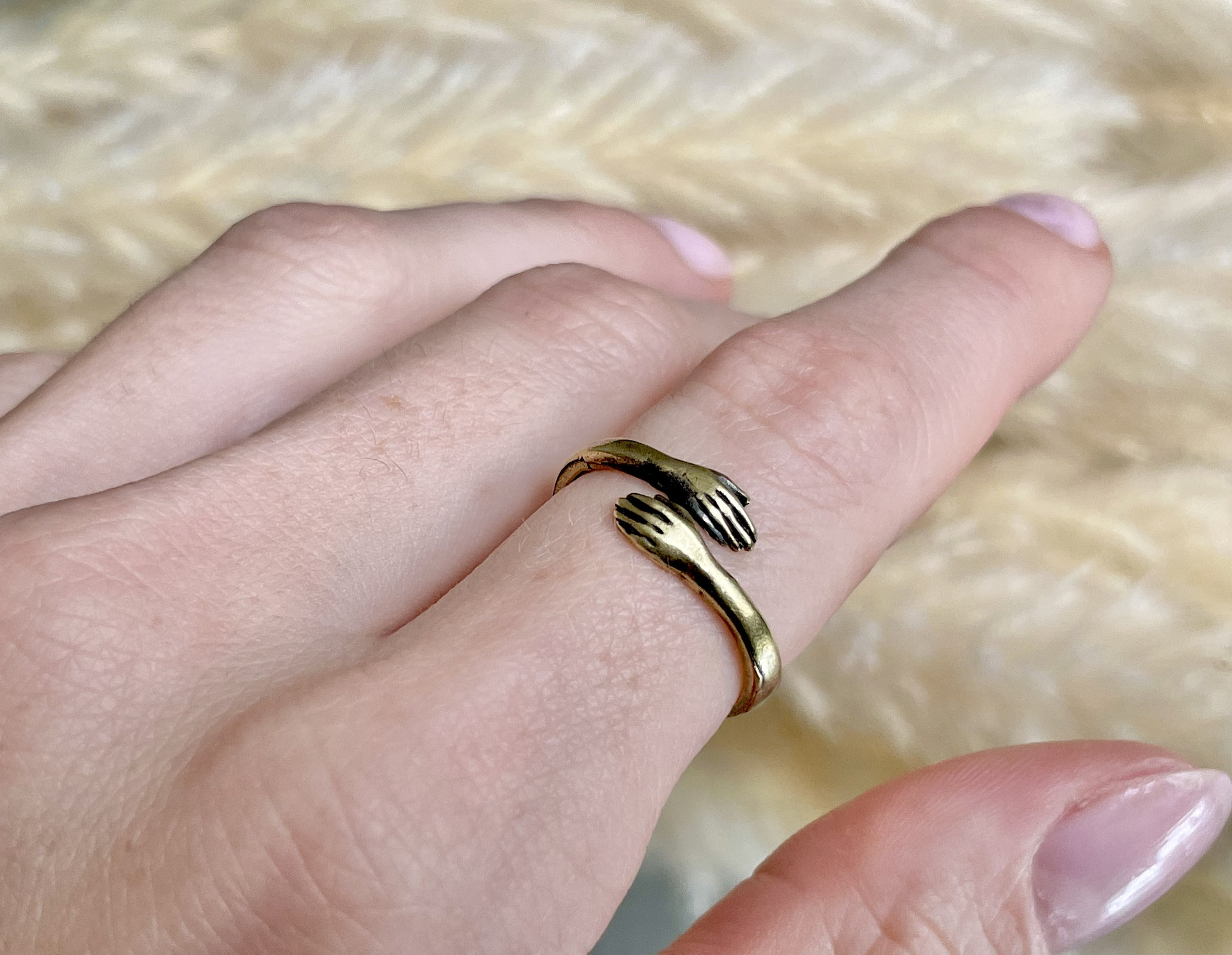 Two hands ring shop