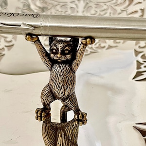 Cat pen holder, Kitten holding a pen, brass tabby Pen rest, Brush holder, Paperweight, Desktop ornament, Cat figurine, Creative gift