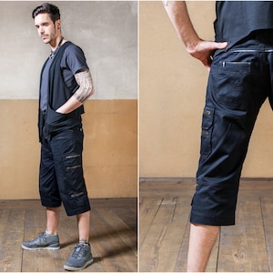 Pantalones cargo para festival, camisa para hombre y pantalones militares con muchos bolsillos, atuendo rave y pantalones cortos cargo negros.