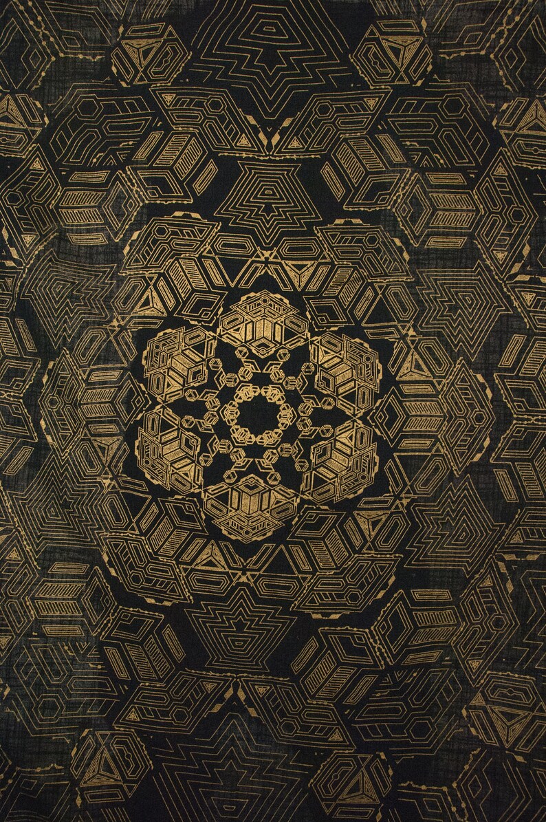 May include: A black and gold geometric pattern with a repeating design. The pattern is intricate and detailed, with a central motif of a star.