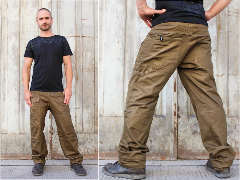 May include: A pair of brown cargo pants with multiple pockets and a zipper detail on the side. The pants are made of a durable, cotton-blend fabric.