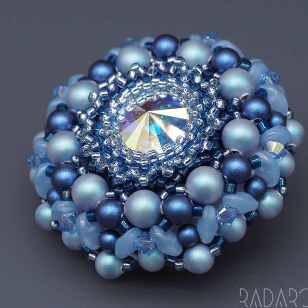 Beaded brooch in blue colors with Swarovski elements