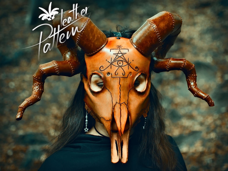 A cultist woman robed in black, wearing a horned animal skull mask made out of leather in the style of esoteric symbolism, dark orange and beige, imitating burnished bone and holding a staff adorned with human skulls made out of leather