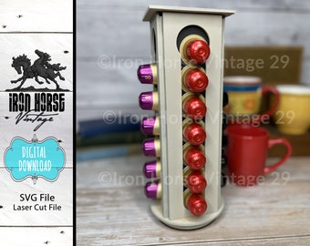 May include: A white wooden rotating stand with eight slots for coffee pods. The stand is made of wood and has a white finish. The stand is designed to hold coffee pods and is a great way to organise your coffee pods. The stand is also a great way to add a touch of style to your kitchen.