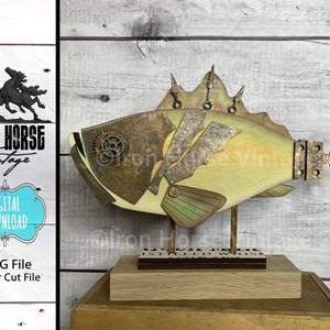 May include: A steampunk-style fish sculpture with a key-shaped tail, made of wood and metal. The fish is painted in shades of green, brown, and gold, and has a detailed, textured surface. The sculpture is mounted on a wooden base.