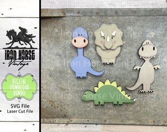 May include: A digital download bundle of four SVG files for laser cutting. The files feature four different dinosaur designs: a blue brachiosaurus, a green stegosaurus, a gray triceratops, and a gray tyrannosaurus rex.