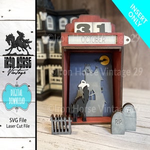 May include: A wooden Halloween calendar with a haunted house scene, a ghost, a black cat, a fence, and two tombstones. The calendar is set to October 31st.