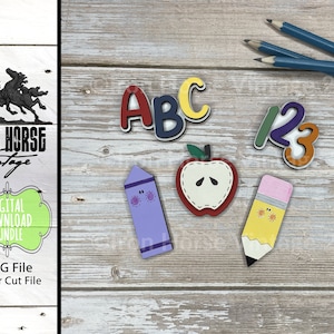 May include: A set of colorful wooden cutouts for a school-themed craft project. The set includes the letters A, B, and C, the numbers 1, 2, and 3, a red apple, a purple crayon, and a yellow pencil.
