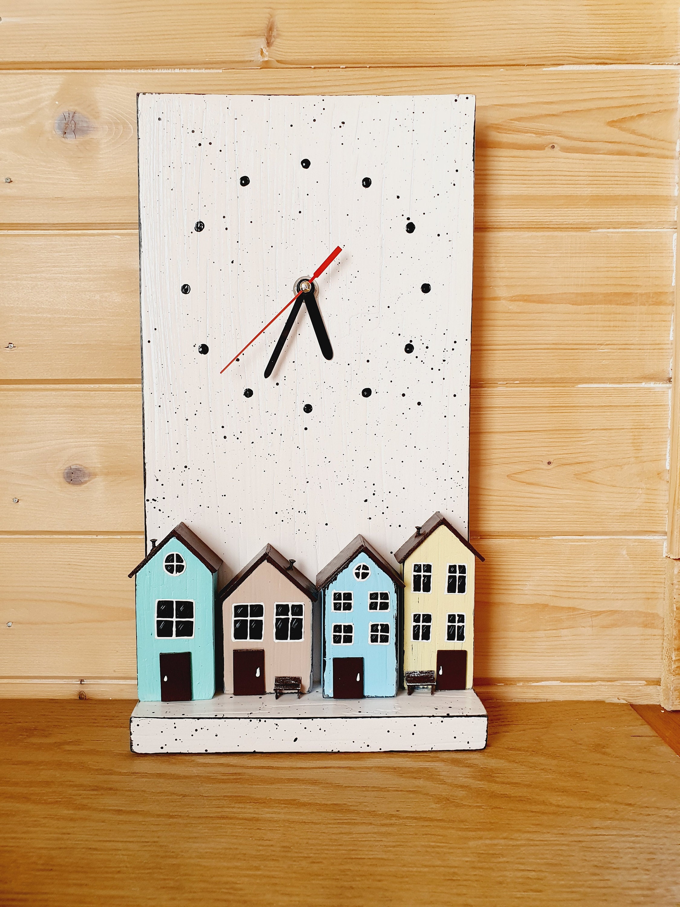 Wall clock with houses.Wall clock with houses. Etsy